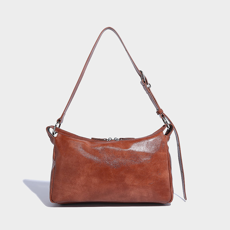 Black color lady shoulder bag with adjustable strap